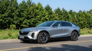 Cadillac Lyriq parked on a scenic road.